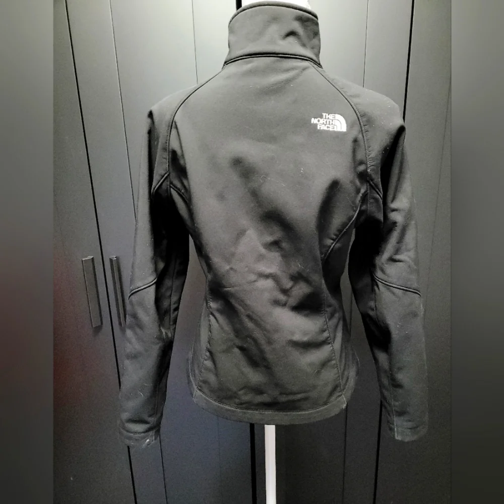 The North Face black zip up jacket